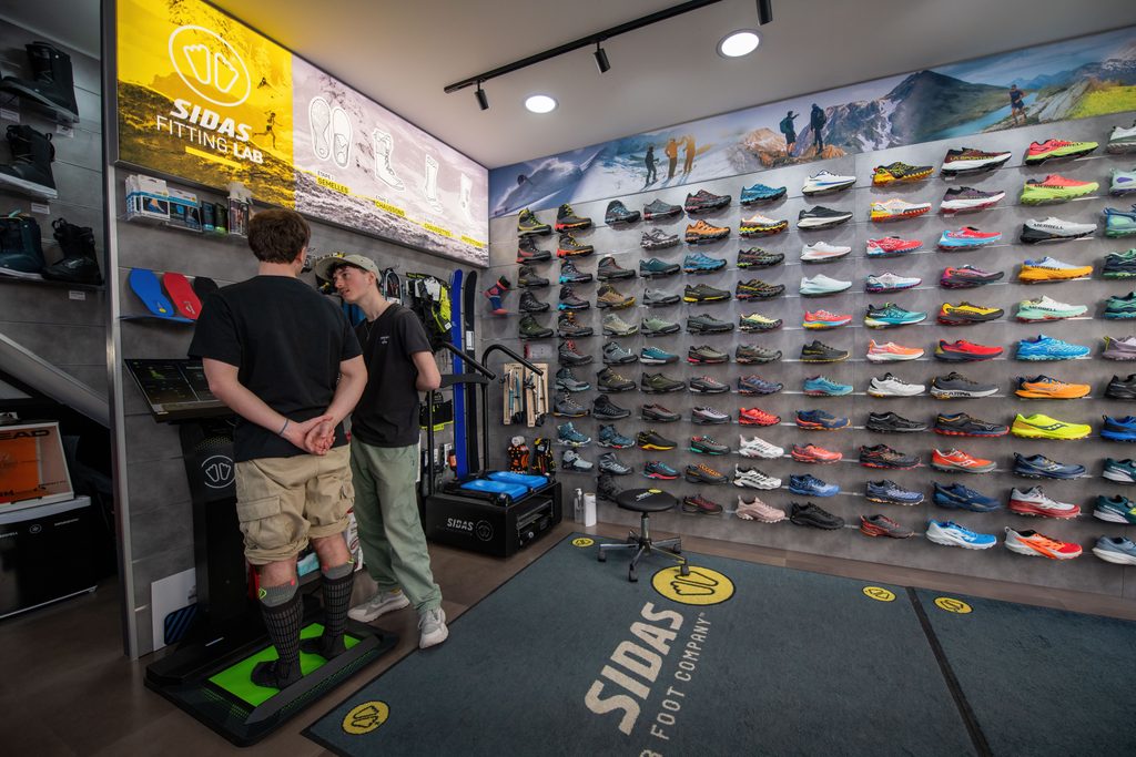 Espace de conseil et d’analyse du pied dans un magasin de sport